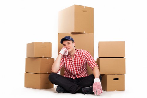 Moving van near elegant Knightsbridge apartments and townhouse entrances